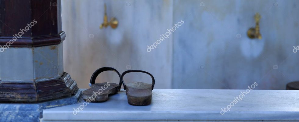 depositphotos 381992734 stock photo view pair clogs used ablution 980x400 1